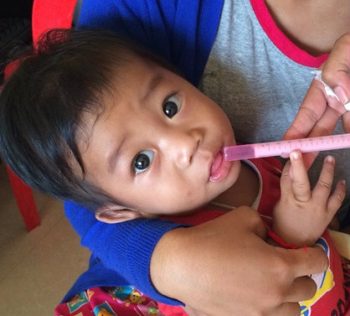 Baby receiving medication