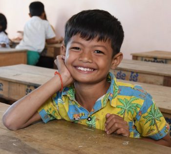 Smiling boy in RSP classroom